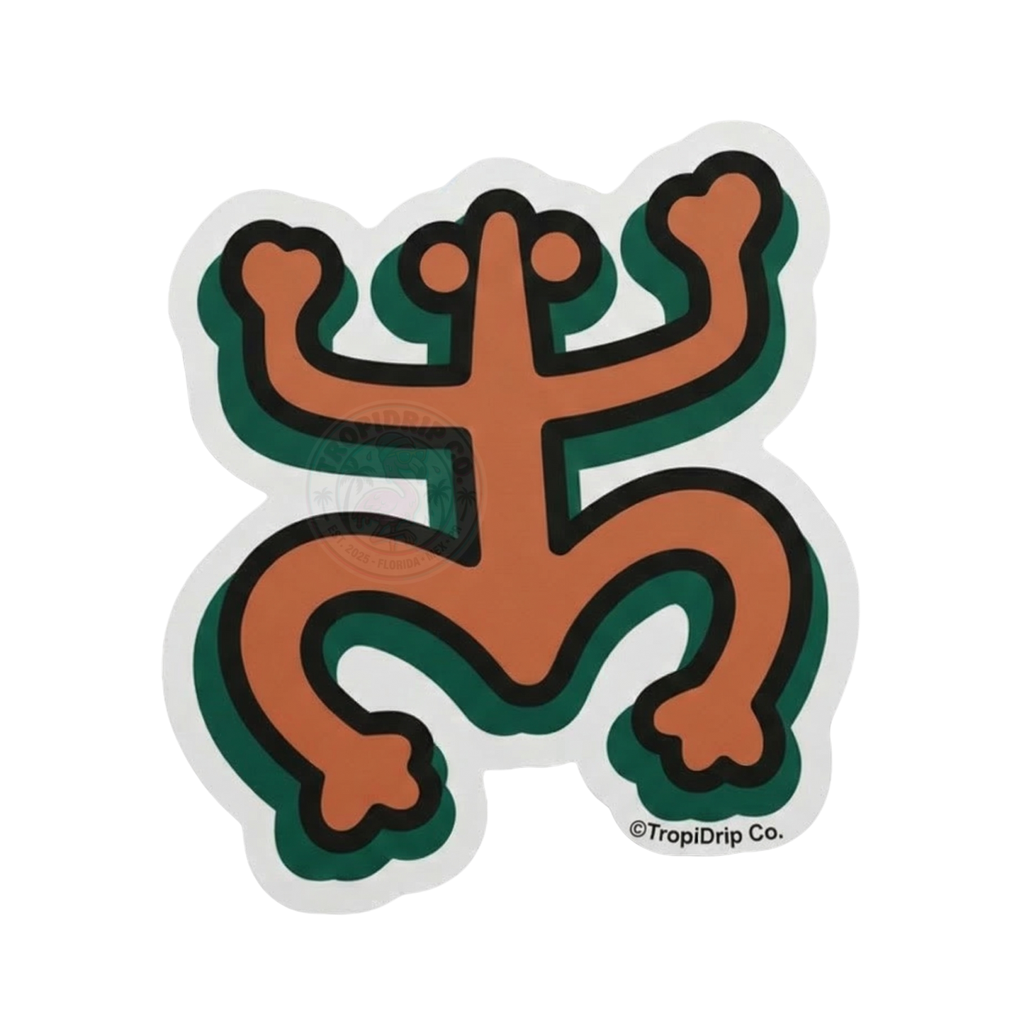 An indigenous Puerto Rican Taíno petroglyph representation of a coquí frog, designed as a die-cut vinyl sticker. The symbol is rendered in a warm, rustic terracotta-orange color with bold black outlines, backed by a clean dark emerald-green offset drop shadow layer. The entire sticker is enclosed within a crisp, solid white contour border with a small copyright symbol and text reading '©TropiDrip Co.' integrated smoothly at the bottom right.